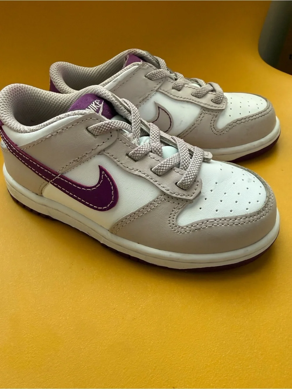 Nike Kids Low-Top Sneakers in White and Purple Accents